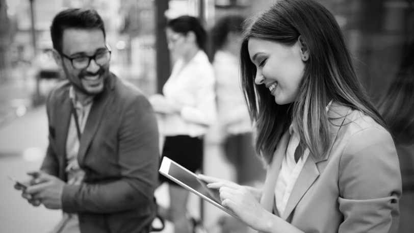 Wealth management investments man woman on devices